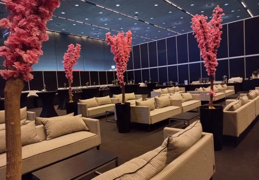 Banquet hall set with round tables and chairs